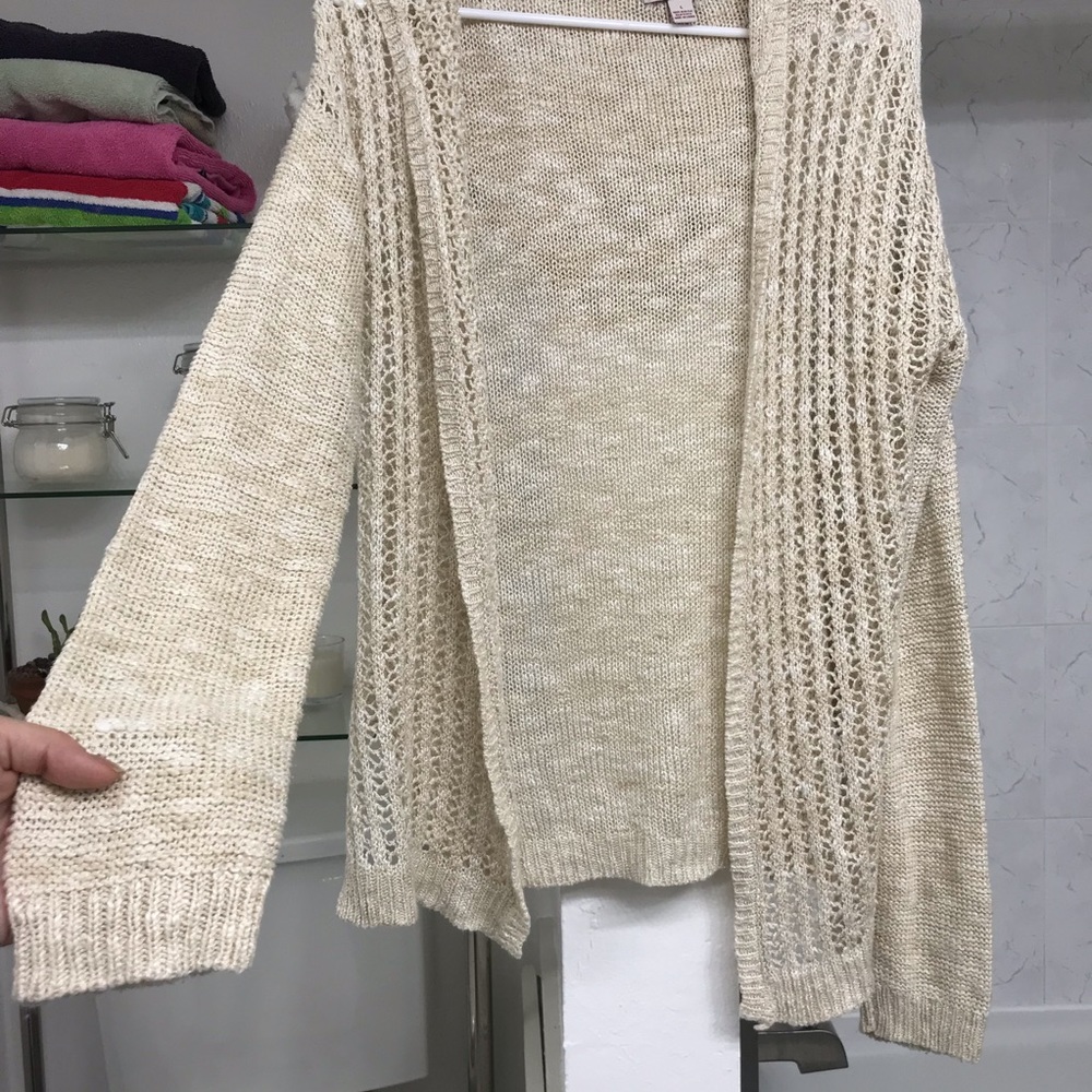 knitted cream- colored cardigan